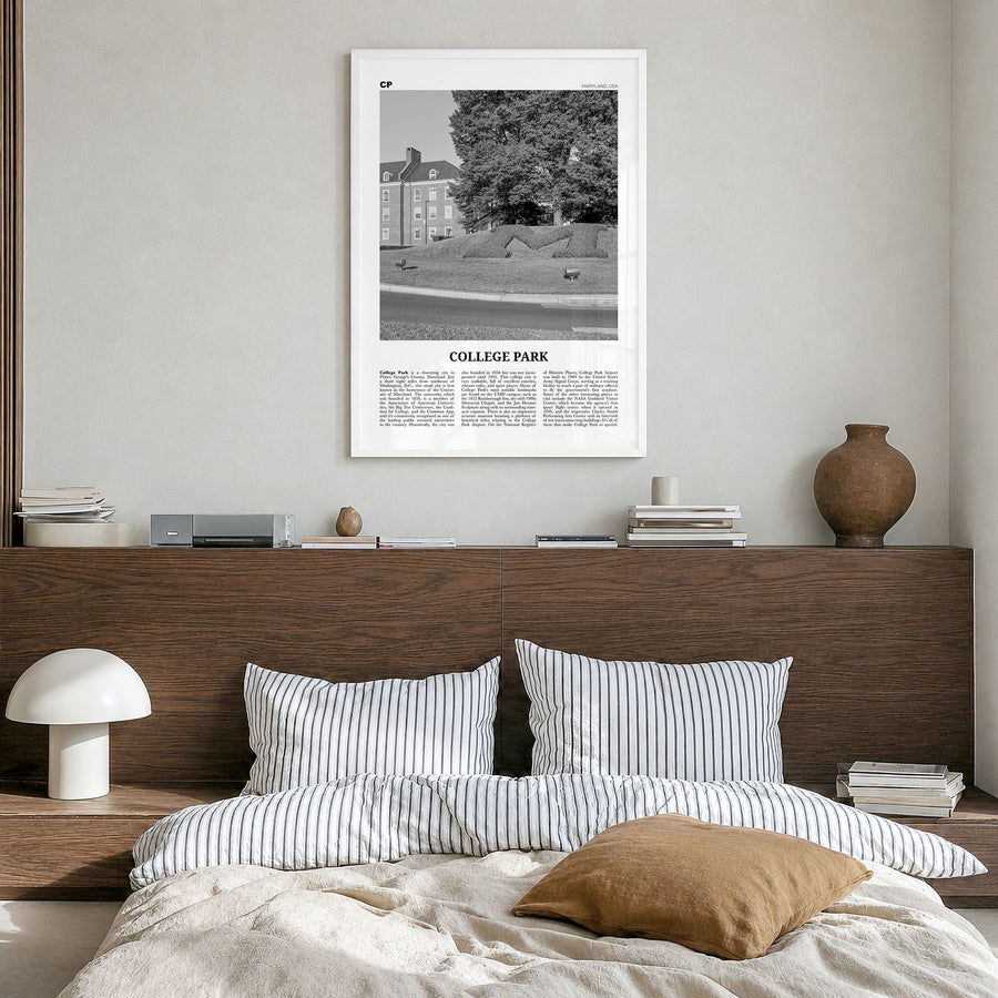 College Park Newspaper Poster in a white wood frame, hanging in a bedroom