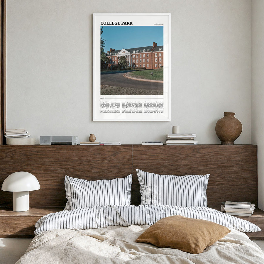 College Park Travel Poster in a white wood frame, hanging in a bedroom