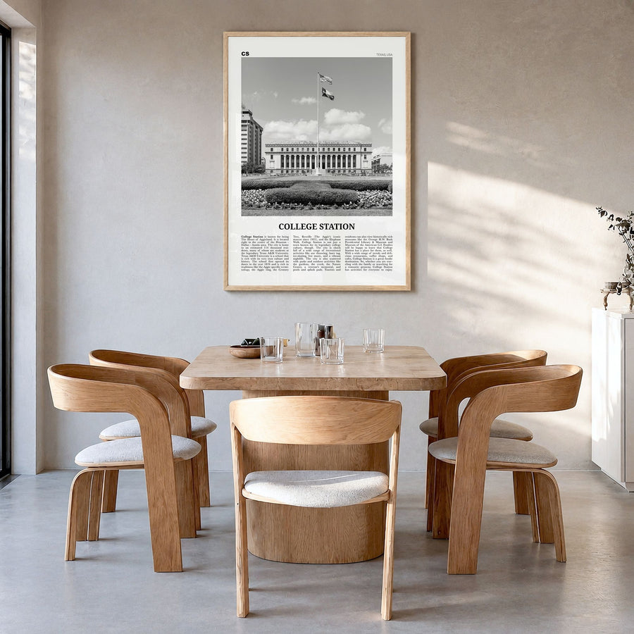College Station Newspaper Poster in a natural wood frame, hanging in a dining room