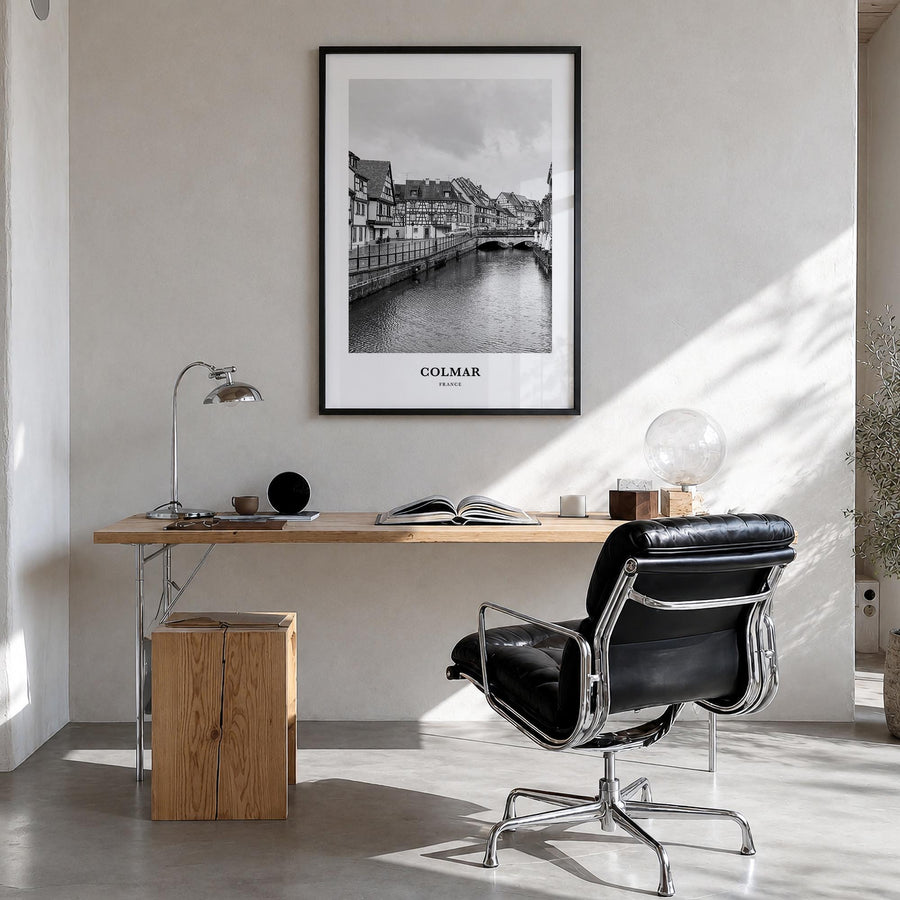 Colmar black & white classic poster of France – vertical wall art in black wood frame, hanging on wall