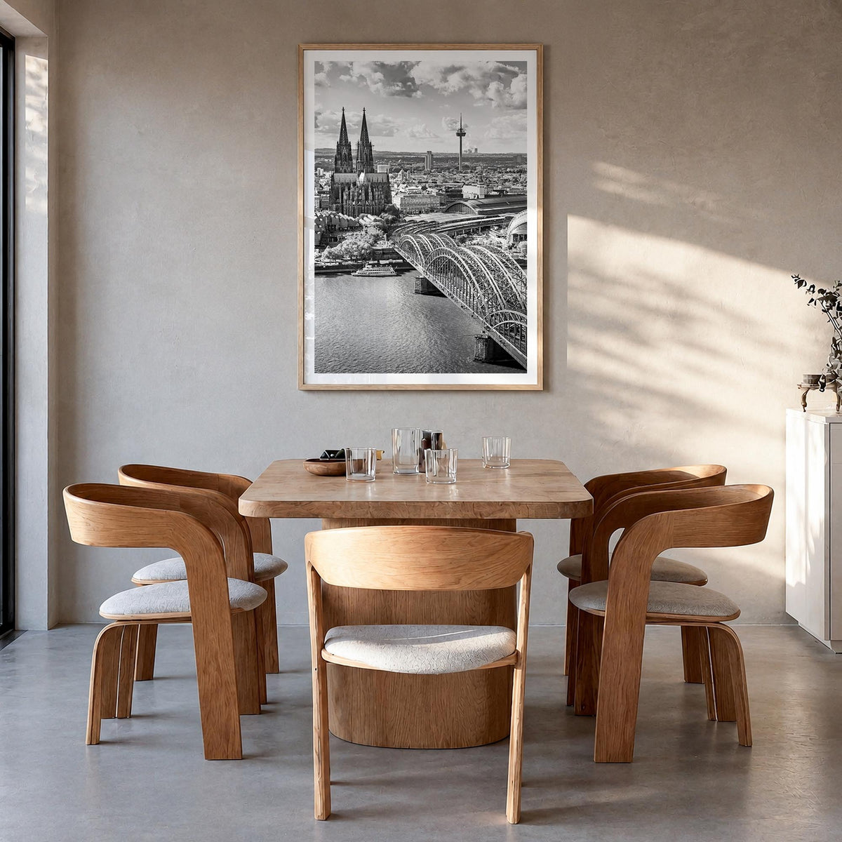 Cologne black & white photo poster of Germany – vertical wall art in natural wood frame with white border, hanging on wall