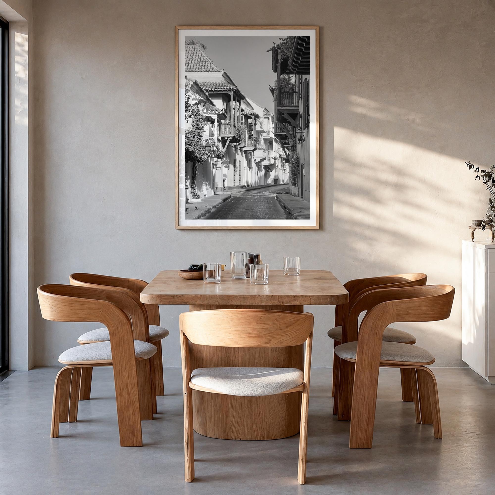 Colombia black & white photo poster of South America – vertical wall art in natural wood frame with white border, hanging on 