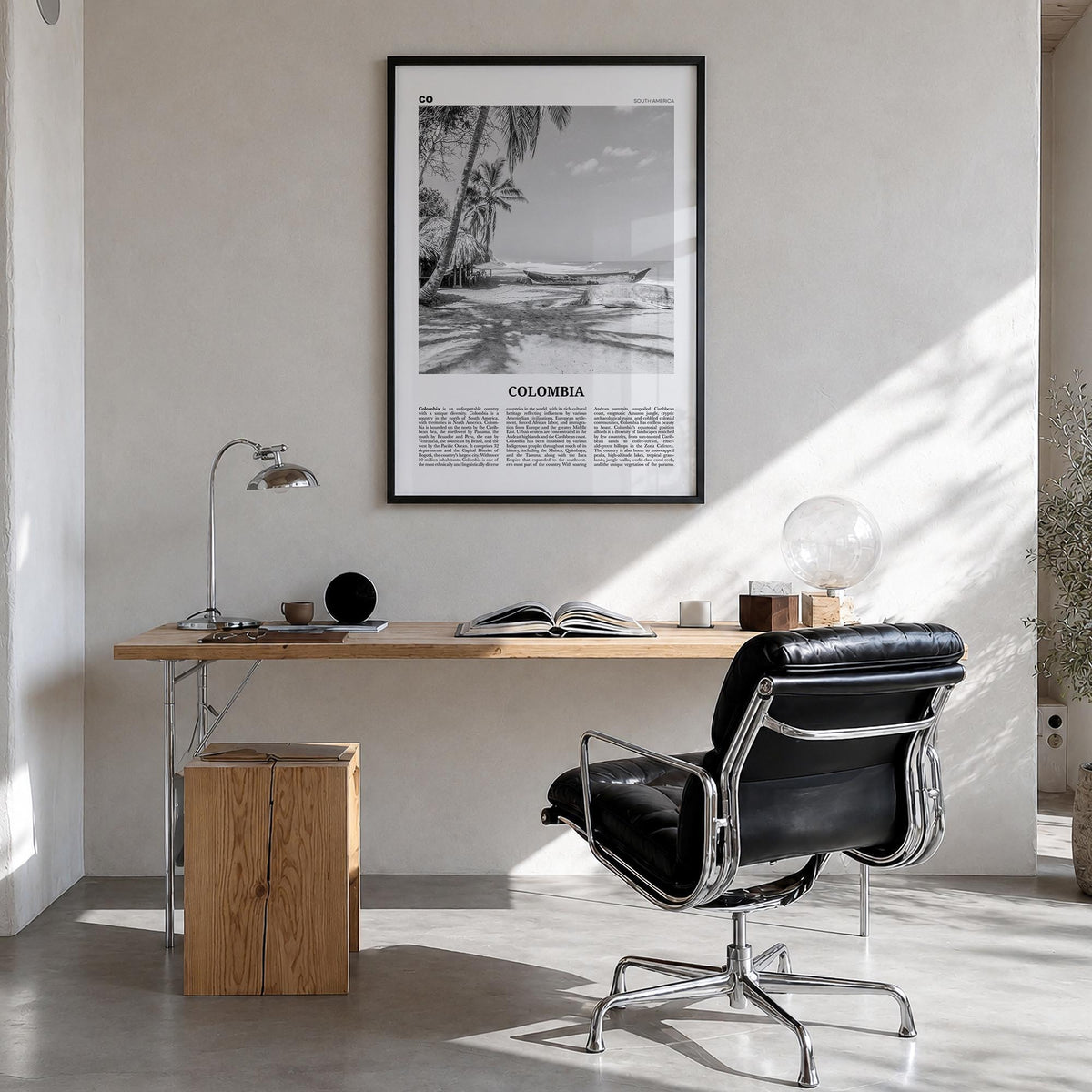 Colombia no. 3 black & white newspaper poster of South America – vertical wall art in black wood frame, hanging on wall