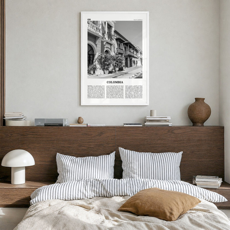 Colombia Newspaper No 2 Poster in a white wood frame, hanging in a bedroom