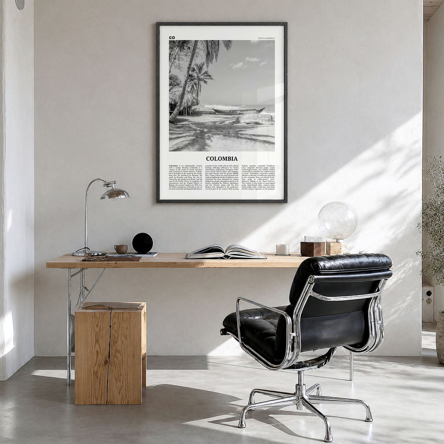 Colombia Newspaper No 3 Poster in a black wood frame, hanging in a bright home office