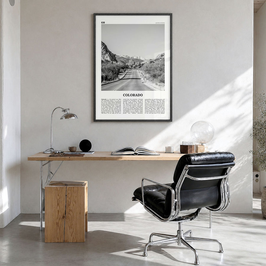 Colorado Newspaper No 2 Poster in a black wood frame, hanging in a bright home office