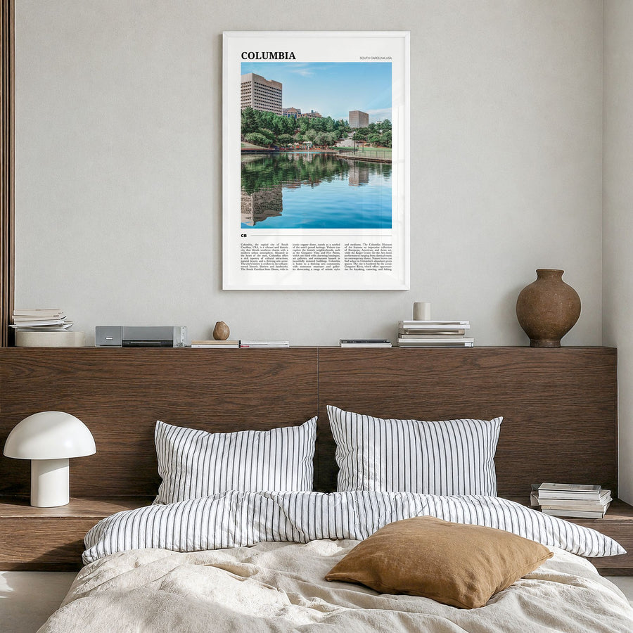 Columbia, South Carolina Travel Poster in a white wood frame, hanging in a bedroom