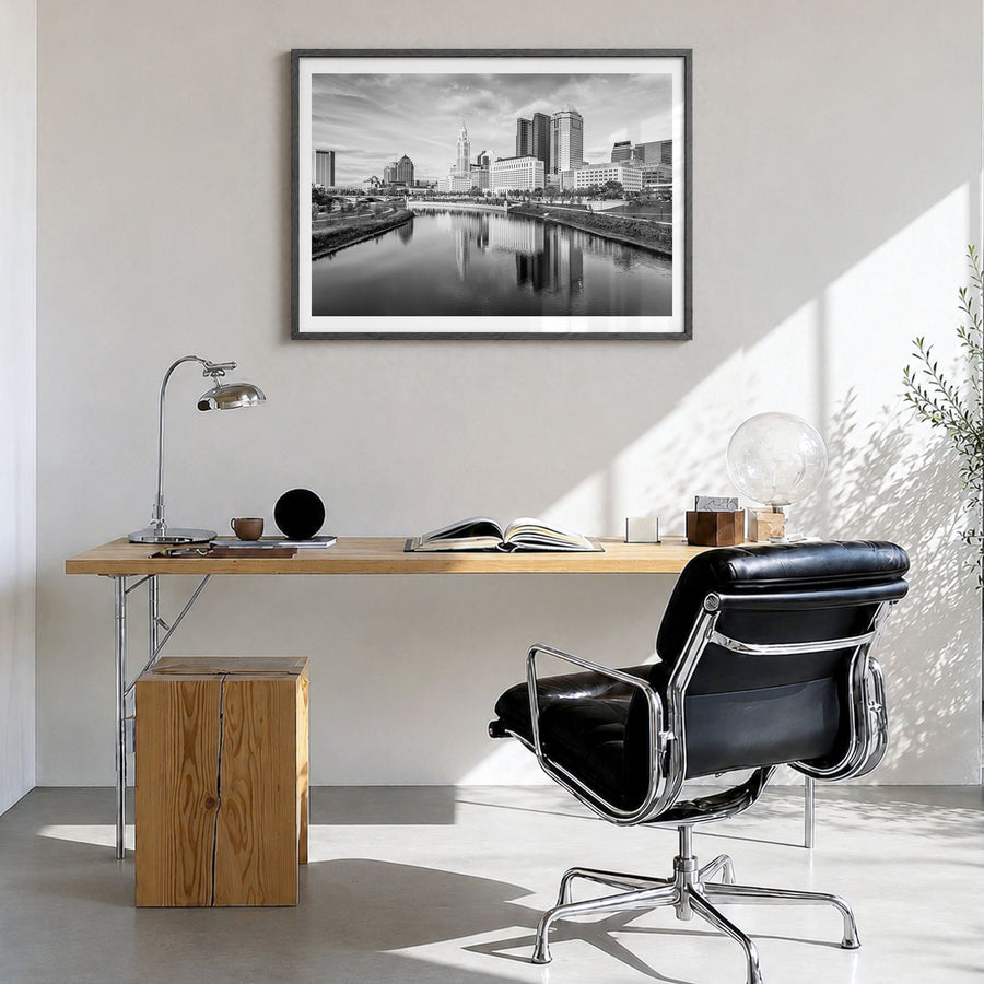 Columbus, Ohio Photo Poster in a black wood frame, hanging in a bright home office, white border