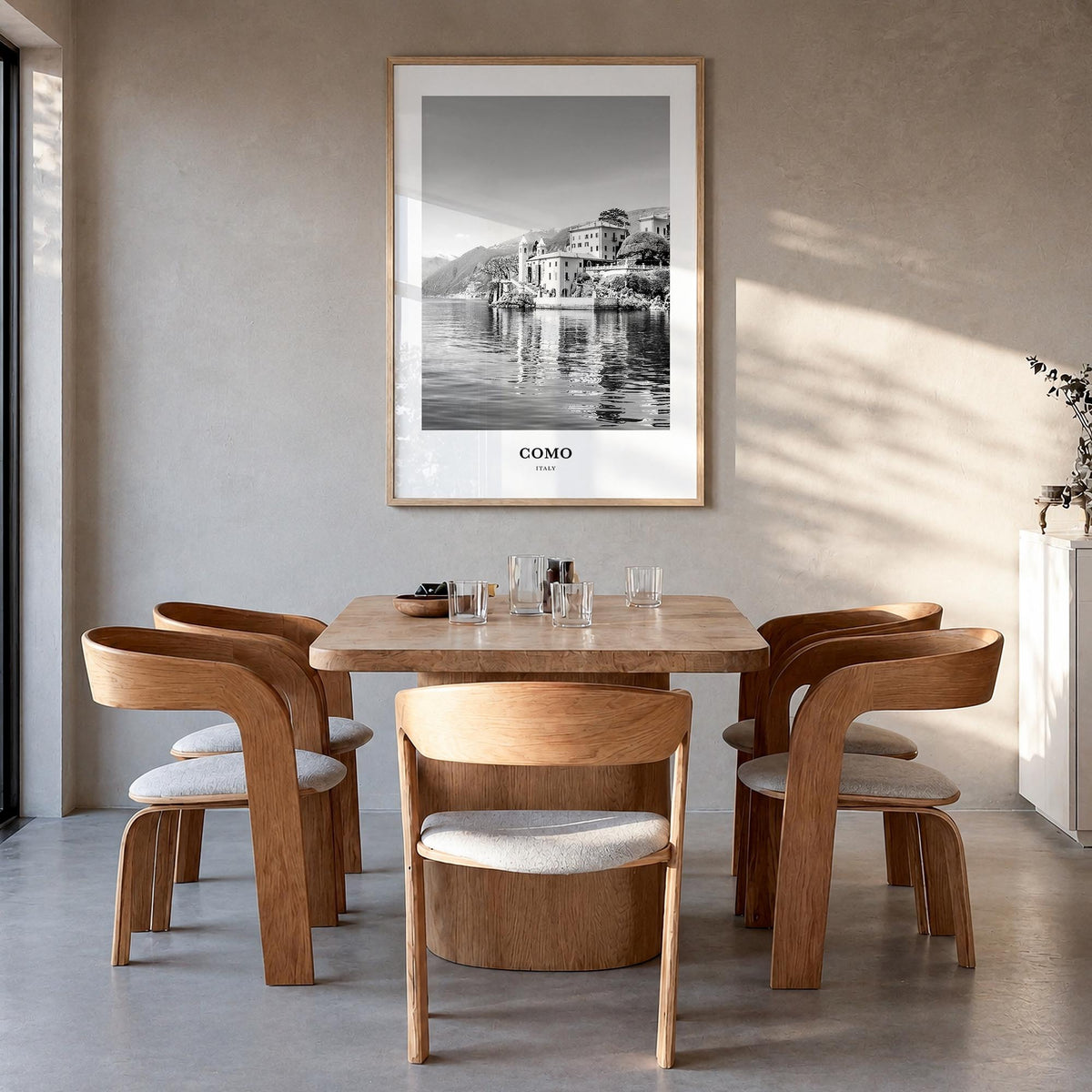 Como no. 1 black & white classic poster of Italy – vertical wall art in natural wood frame, hanging on wall