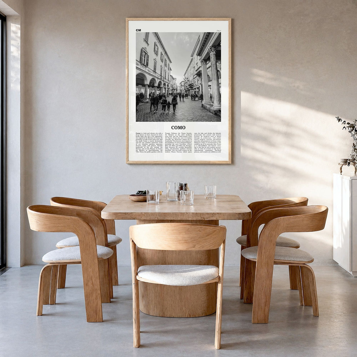 Como Newspaper No 2 Poster in a natural wood frame, hanging in a dining room