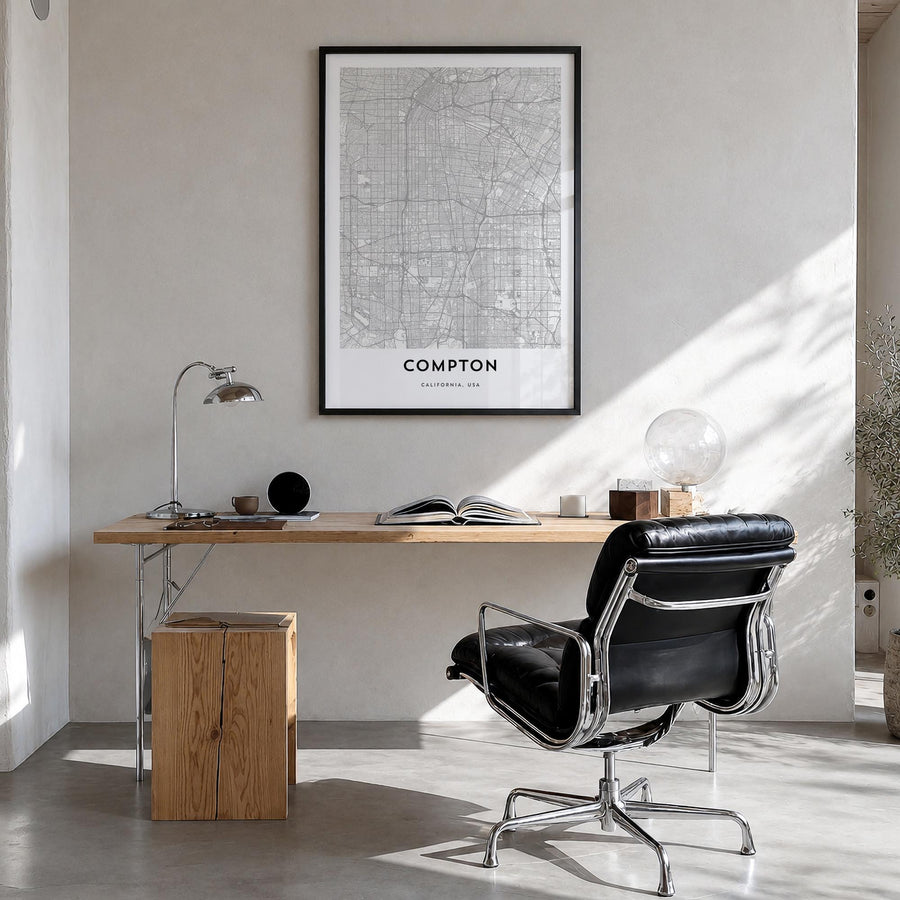 Compton black & white map poster of California, USA – vertical wall art in black wood frame, hanging on wall