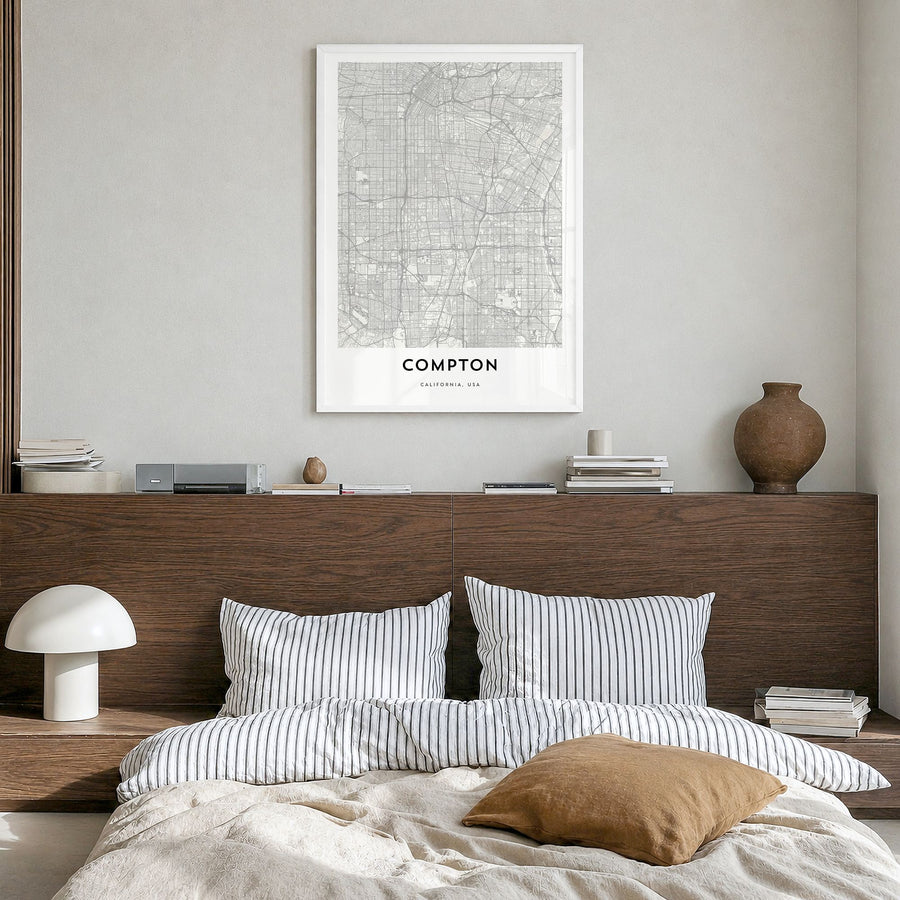 Compton Map Poster in a white wood frame, hanging in a bedroom