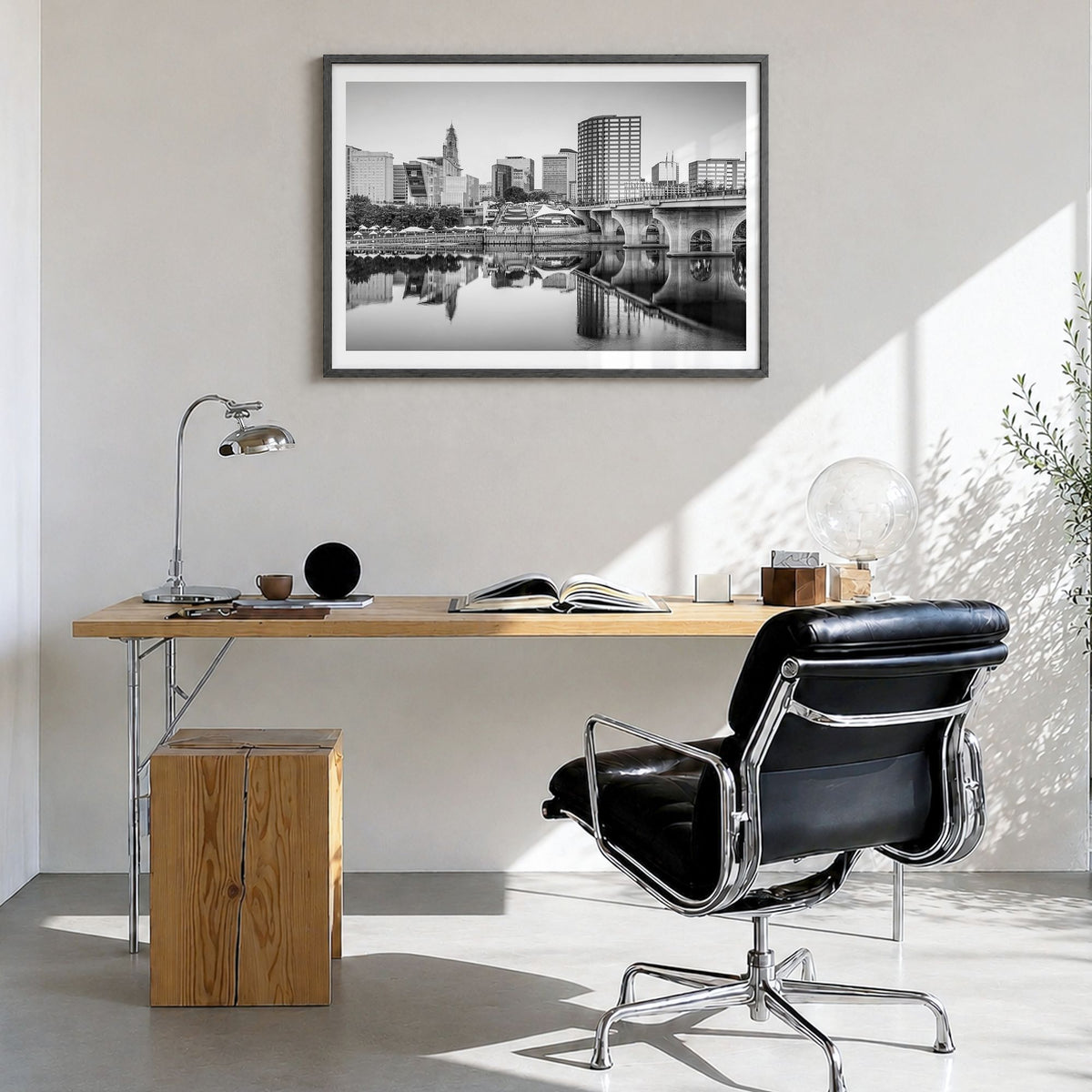Connecticut Photo Poster in a black wood frame, hanging in a bright home office, white border