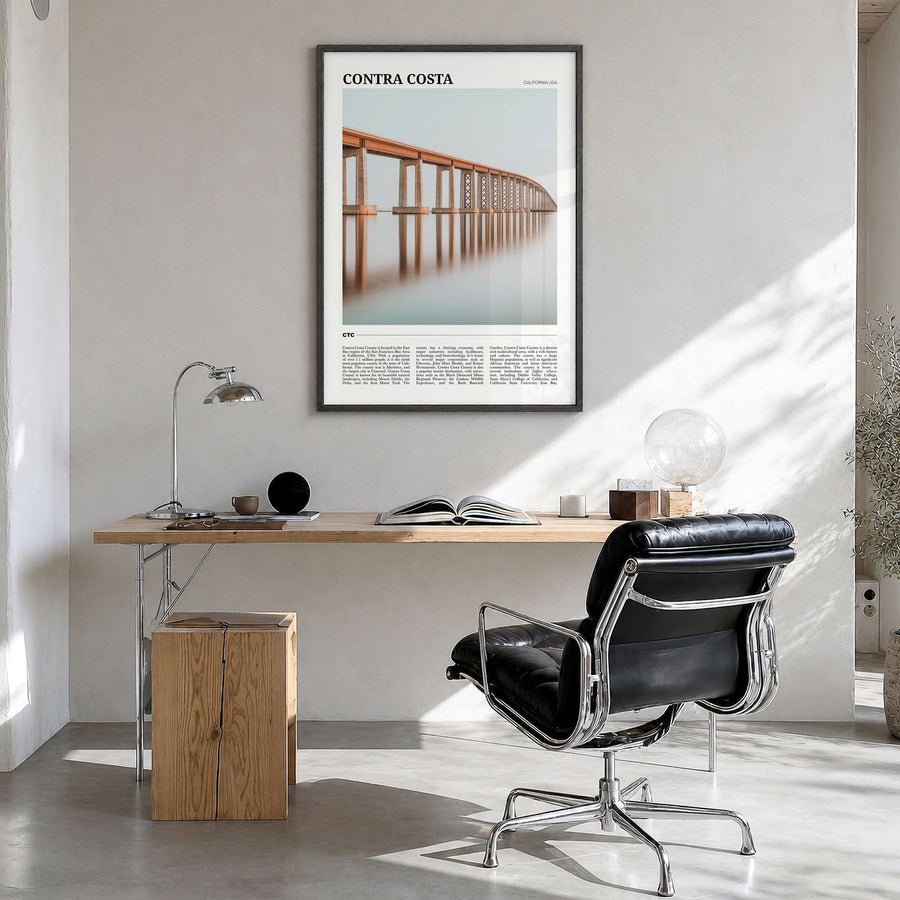 Contra Costa County Travel Poster in a black wood frame, hanging in a bright home office