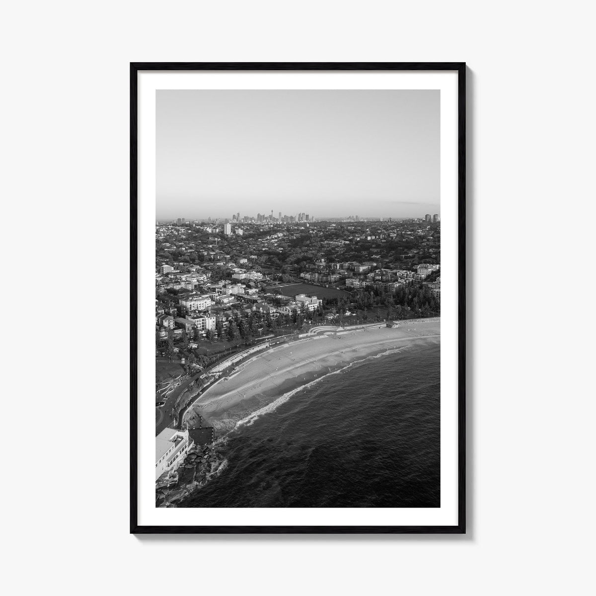 Coogee Beach black & white photo poster of Sydney, New South Wales – vertical wall art, unframed print shown in interior mock