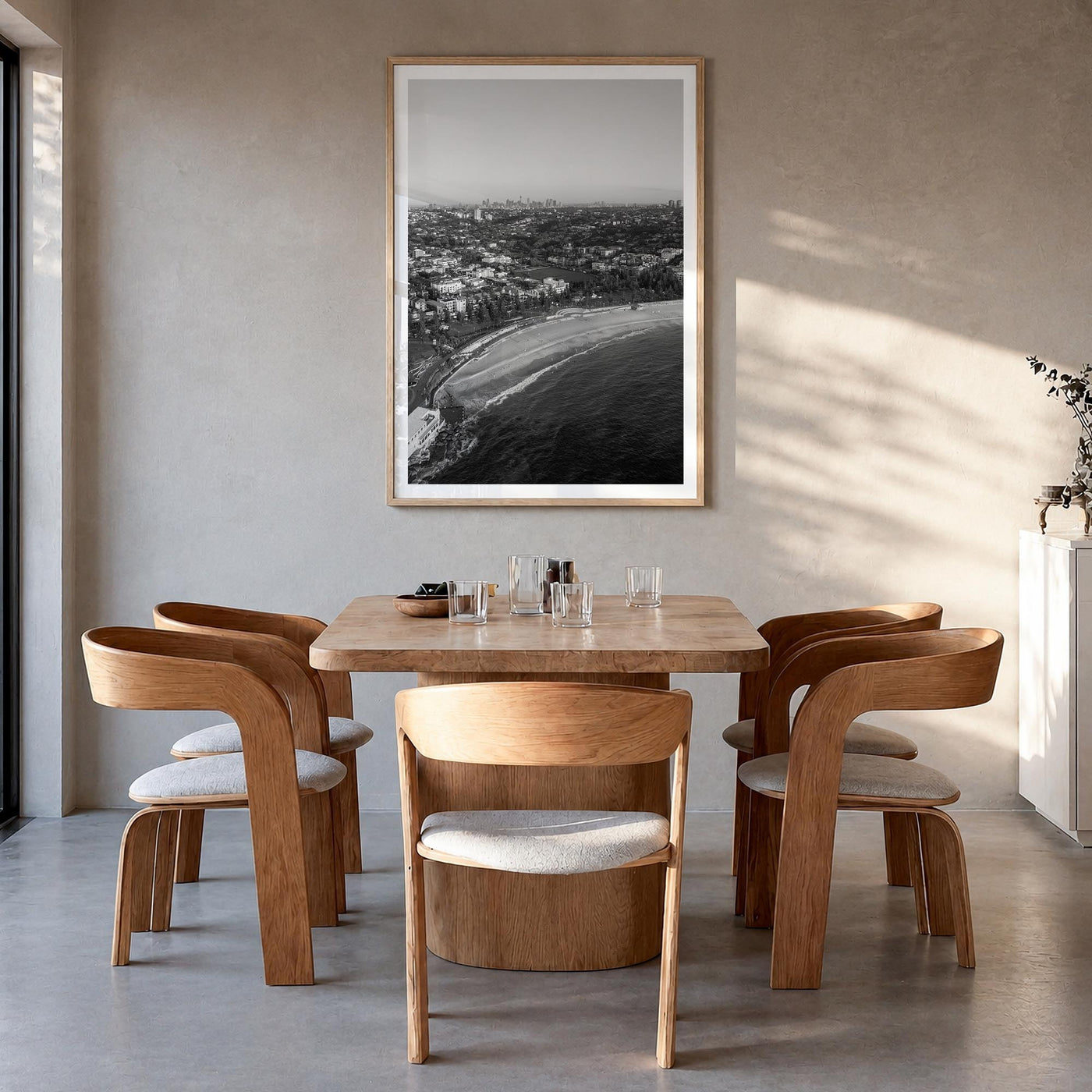 Coogee Beach black & white photo poster of Sydney, New South Wales – vertical wall art in natural wood frame with white borde