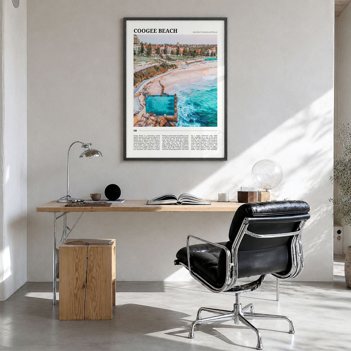 Coogee Beach Travel No 1 Poster in a black wood frame, hanging in a bright home office