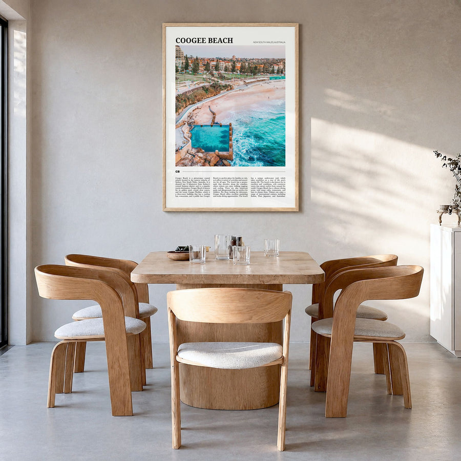 Coogee Beach Travel No 1 Poster in a natural wood frame, hanging in a dining room