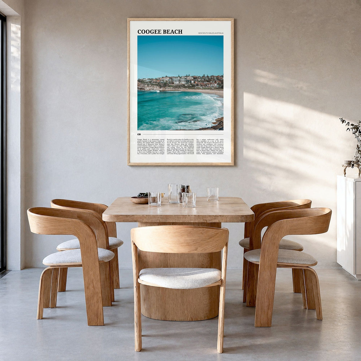 Coogee Beach Travel No 2 Poster in a natural wood frame, hanging in a dining room