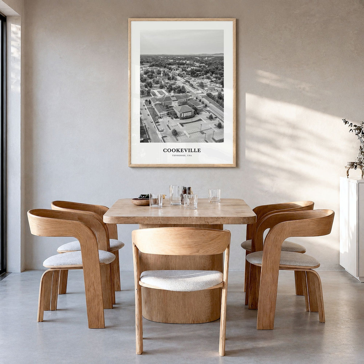 Cookeville Classic Poster in a natural wood frame, hanging in a dining room
