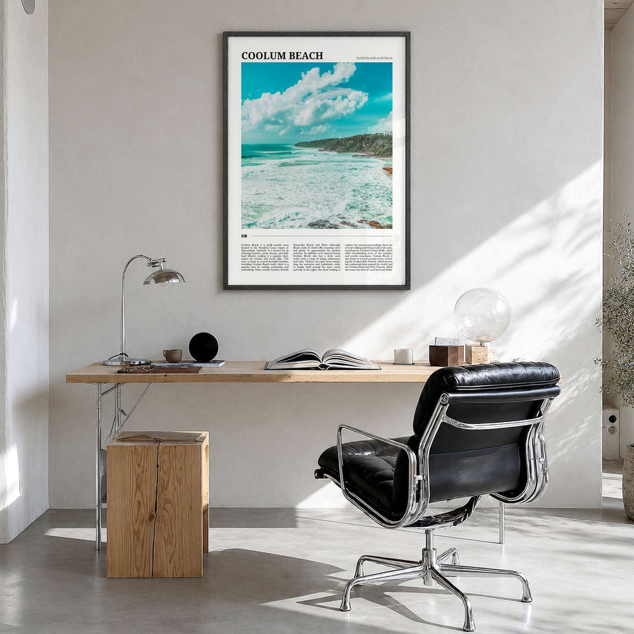Coolum Beach Travel Poster in a black wood frame, hanging in a bright home office
