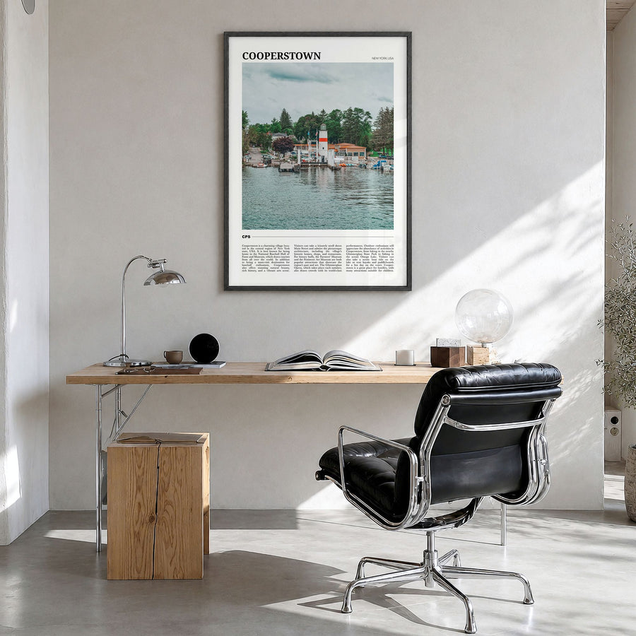 Cooperstown Travel Poster in a black wood frame, hanging in a bright home office