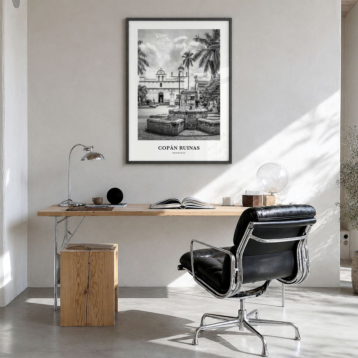 Copán Ruinas Classic Poster in a black wood frame, hanging in a bright home office