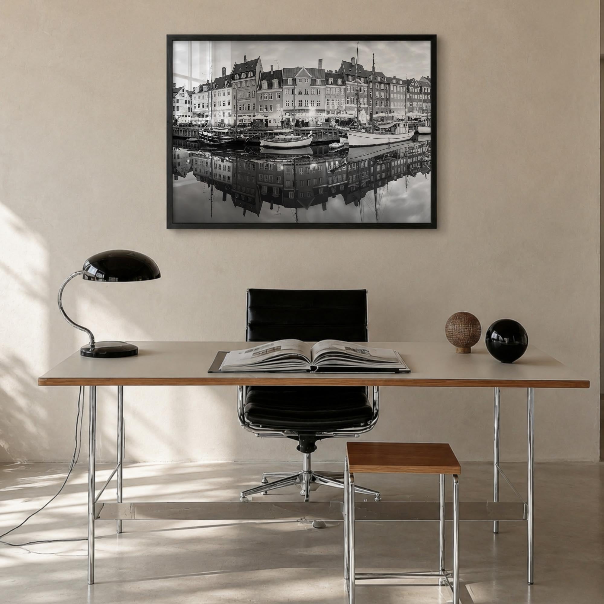 Copenhagen black & white photo poster of Denmark – horizontal wall art in black wood frame, hanging on wall