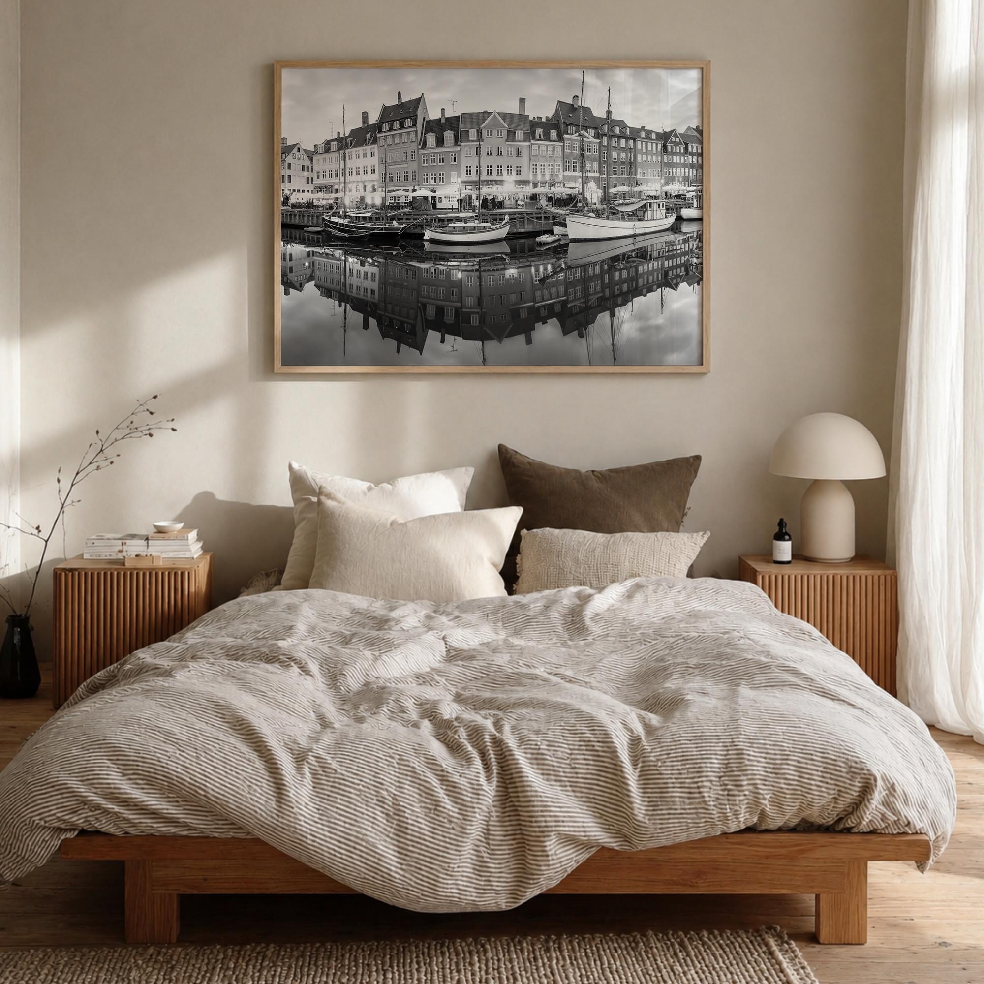 Copenhagen black & white photo poster of Denmark – horizontal wall art in natural wood frame, hanging on wall