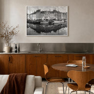 Copenhagen black & white photo poster of Denmark – horizontal wall art in white wood frame, hanging on wall