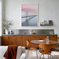 Copenhagen no. 3 colorful photo poster of Denmark – vertical wall art in white wood frame, hanging on wall