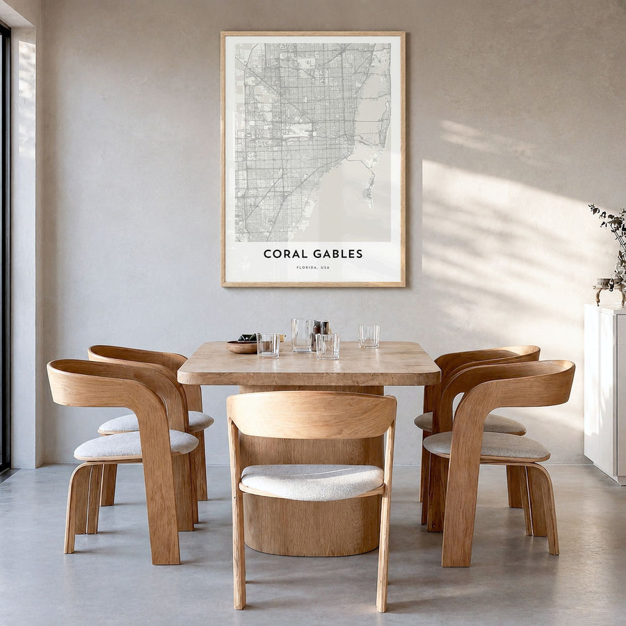 Coral Gables Map Poster in a natural wood frame, hanging in a dining room