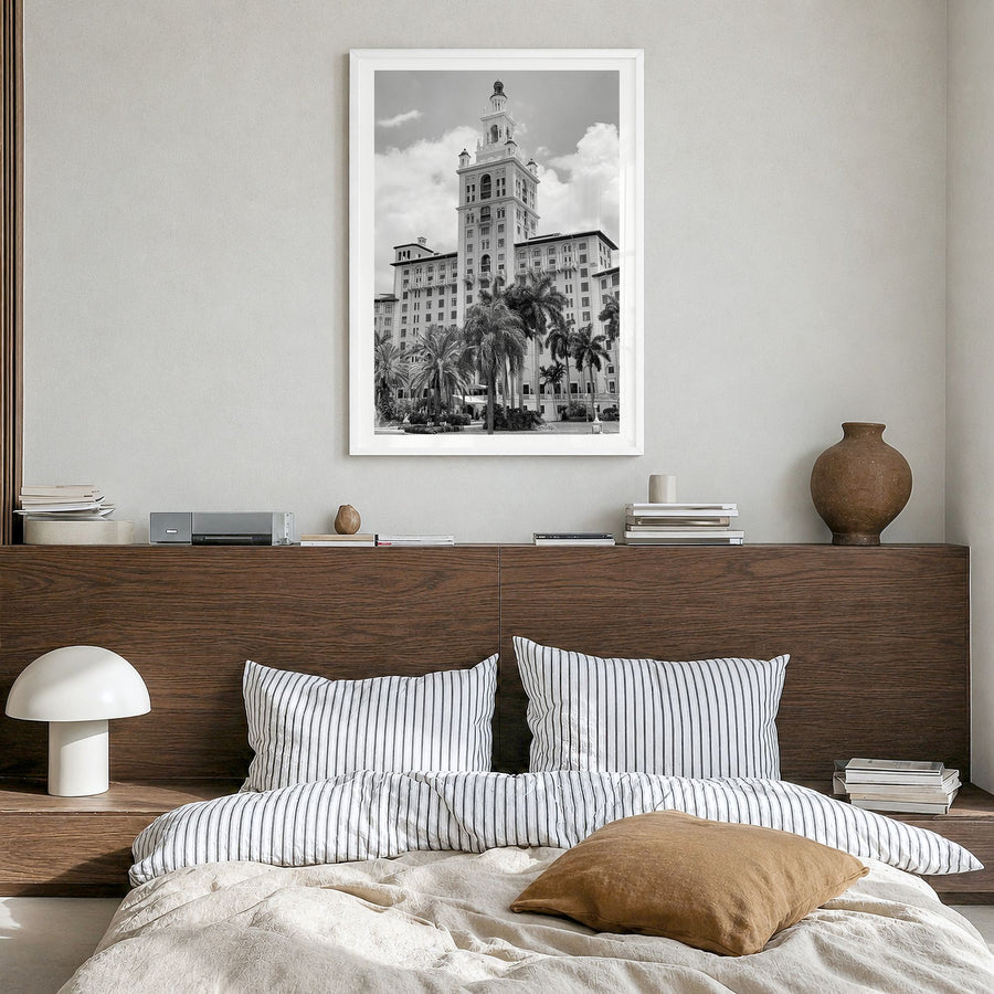 Coral Gables Photo Poster in a white wood frame, hanging in a bedroom, white border
