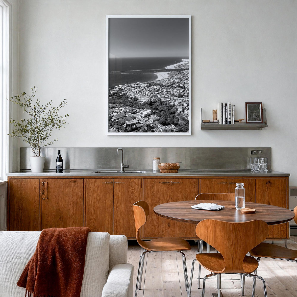 Corona del Mar black & white photo poster of Newport Beach, California – vertical wall art in white wood frame, hanging on wa