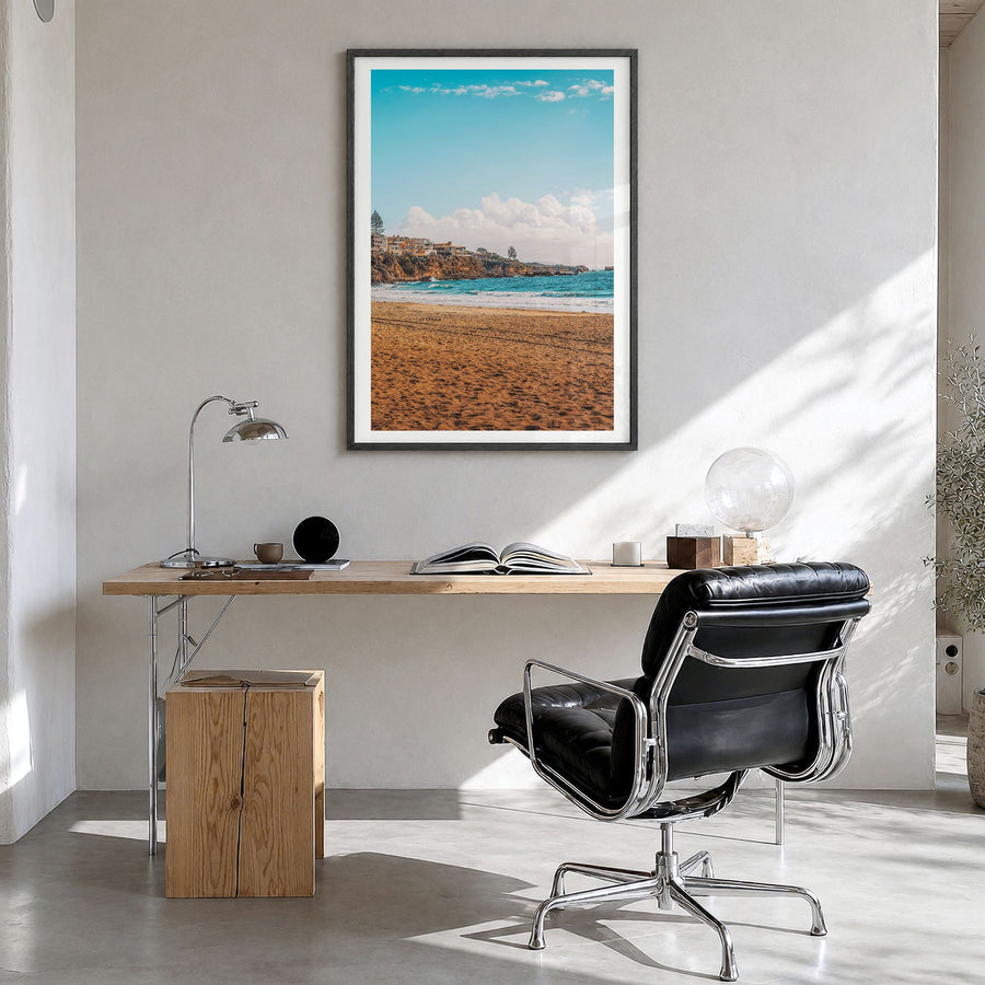 Corona del Mar Photo Poster in a black wood frame, hanging in a bright home office, white border