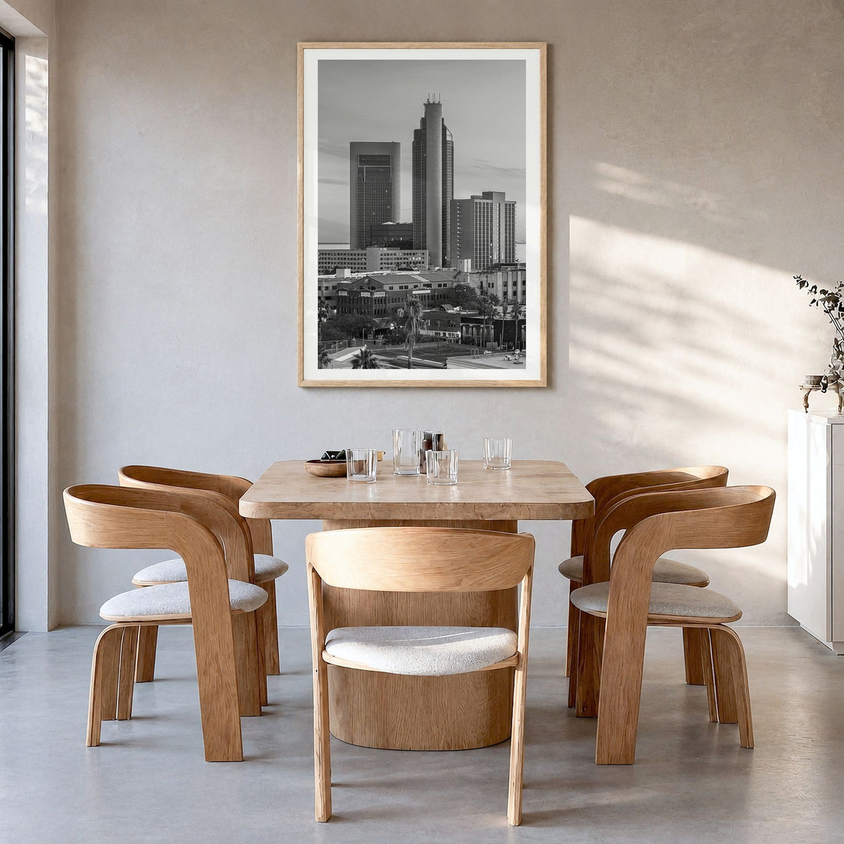Corpus Christi Photo Poster in a natural wood frame, hanging in a dining room, white border