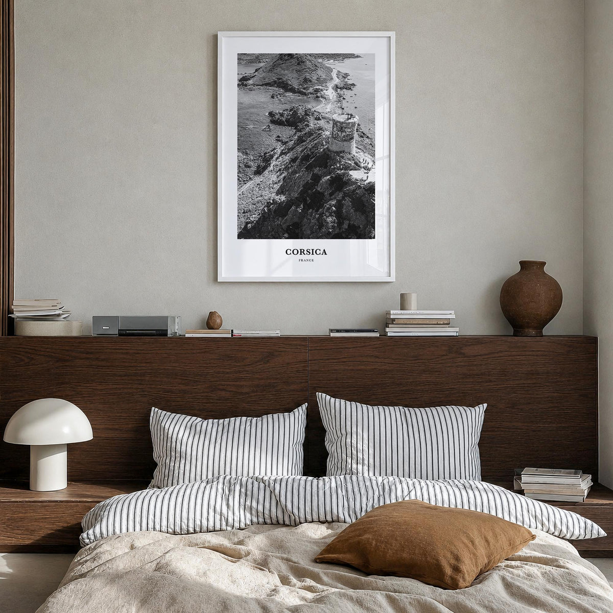 Corsica black & white classic poster of France – vertical wall art in white wood frame, hanging on wall