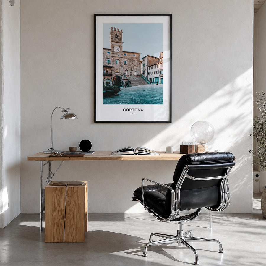 Cortona colorful classic poster of Italy – vertical wall art in black wood frame, hanging on wall