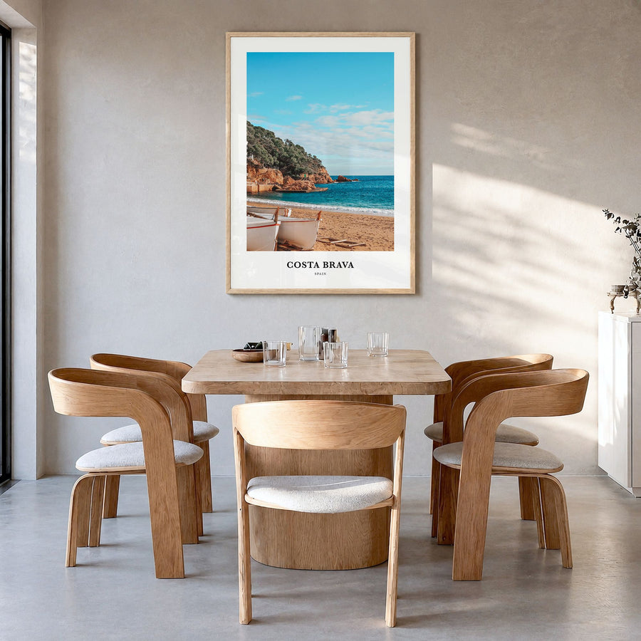 Costa Brava Classic No 2 Poster in a natural wood frame, hanging in a dining room