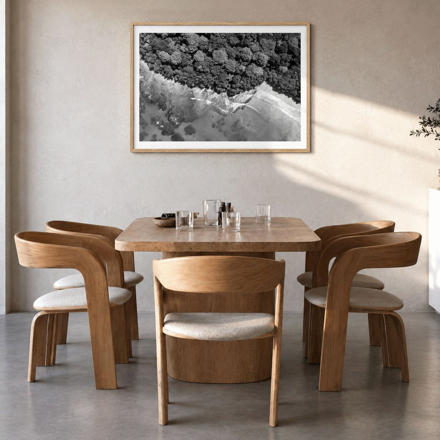 Costa Rica Photo Poster in a natural wood frame, hanging in a dining room, white border