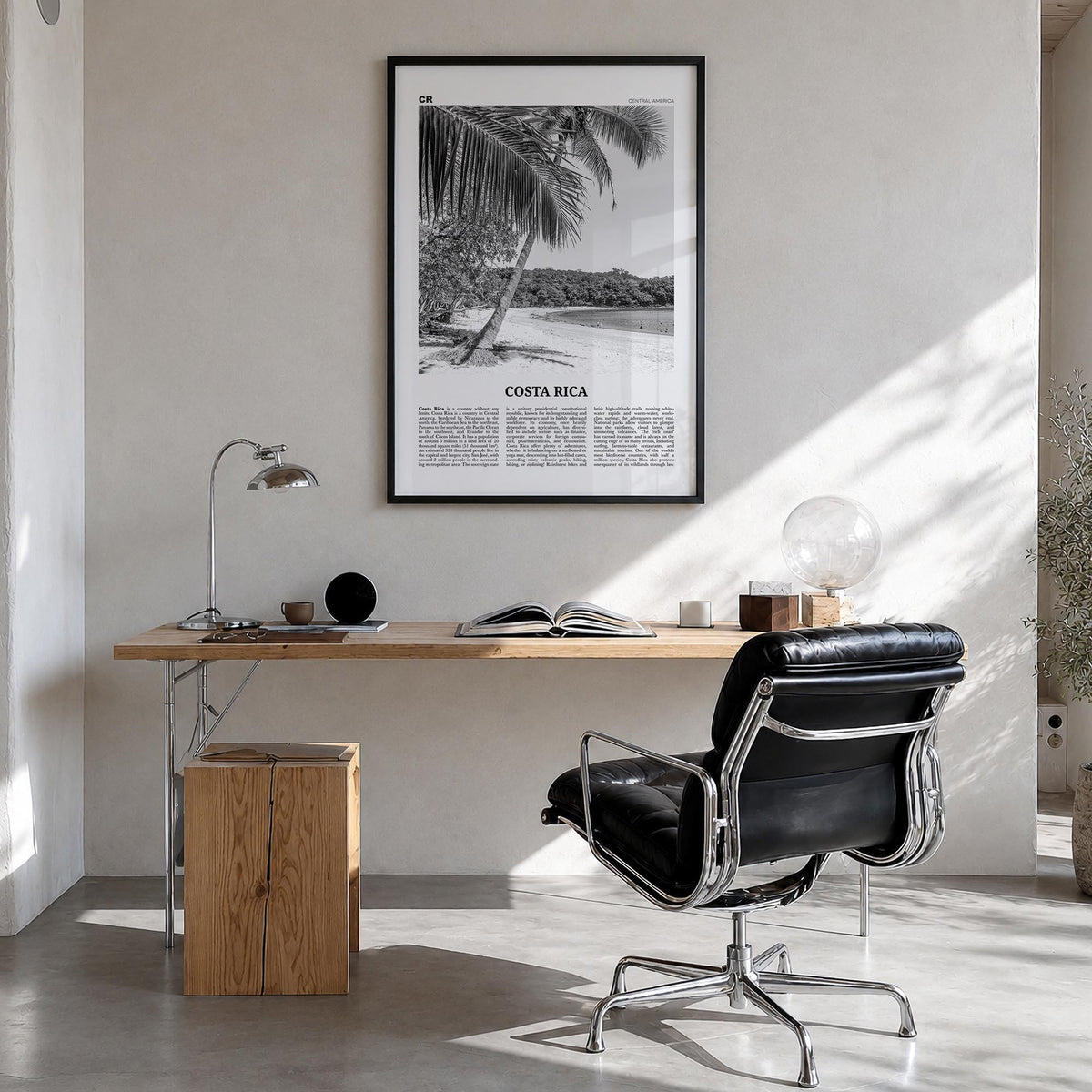 Costa Rica no. 2 black & white newspaper poster of Central America – vertical wall art in black wood frame, hanging on wall