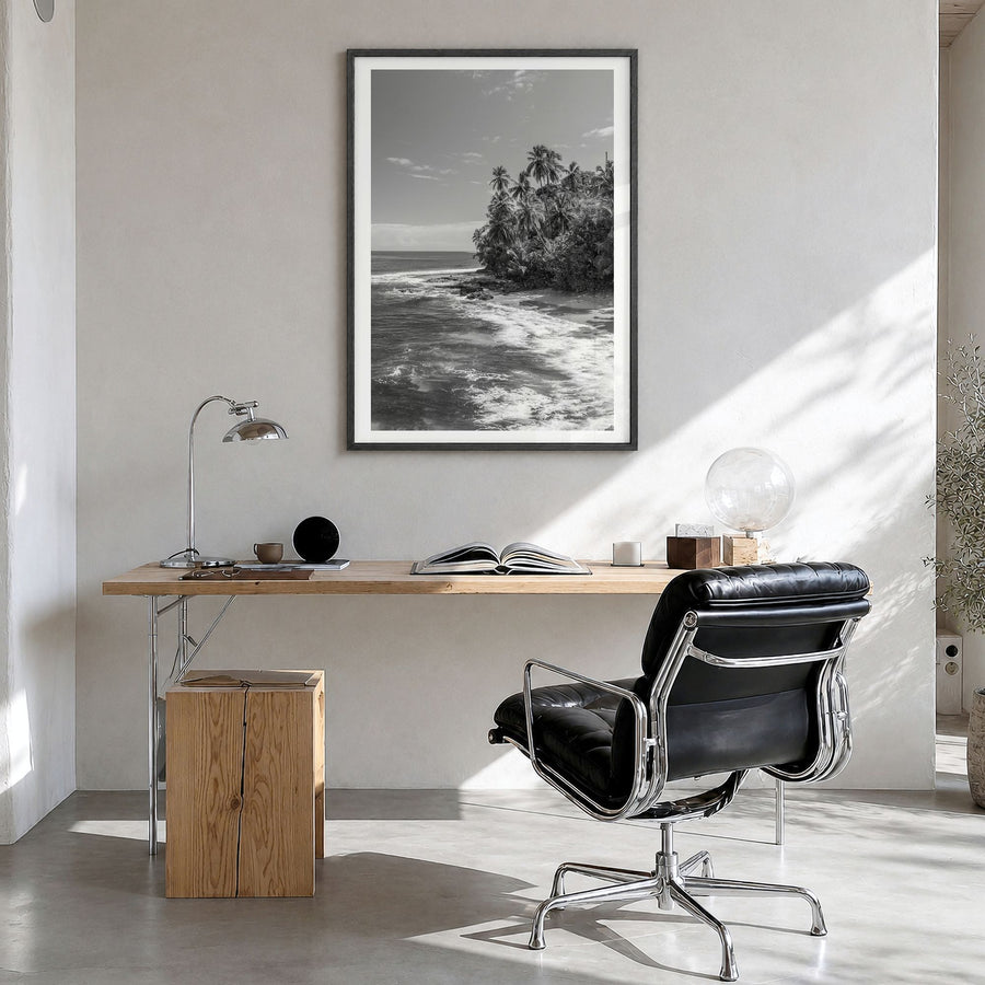 Costa Rica Photo Poster in a black wood frame, hanging in a bright home office, white border