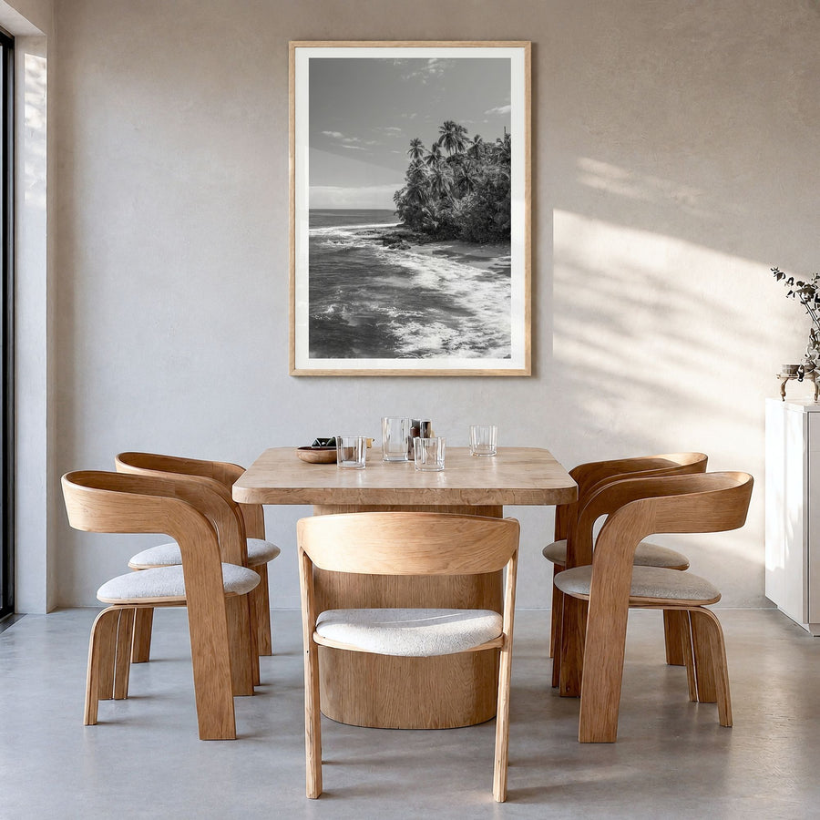 Costa Rica Photo Poster in a natural wood frame, hanging in a dining room, white border