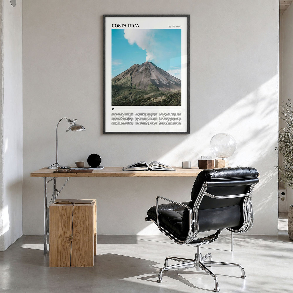 Costa Rica Travel Poster in a black wood frame, hanging in a bright home office