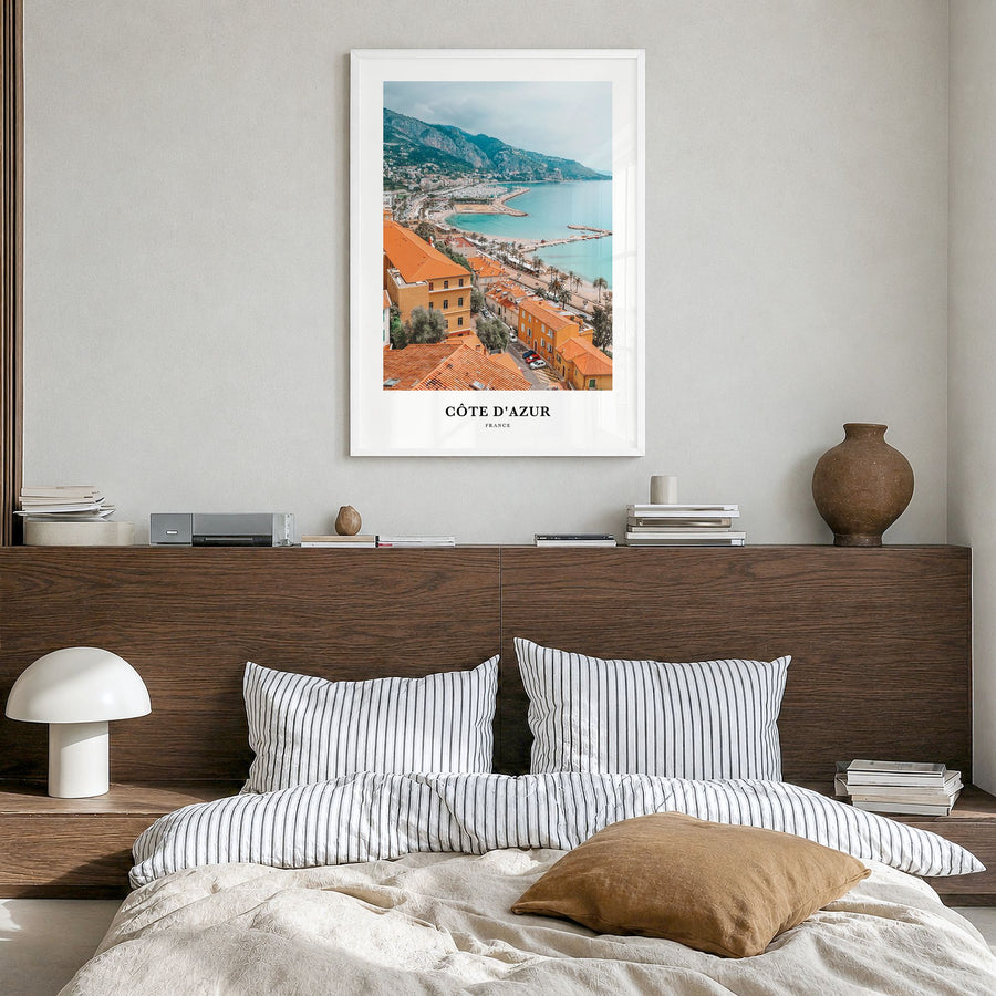 Côte d'Azur Classic No 1 Poster in a white wood frame, hanging in a bedroom