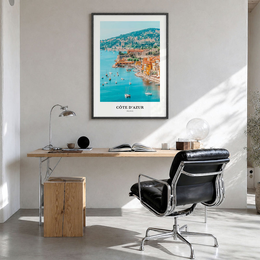 Côte d'Azur Classic No 2 Poster in a black wood frame, hanging in a bright home office