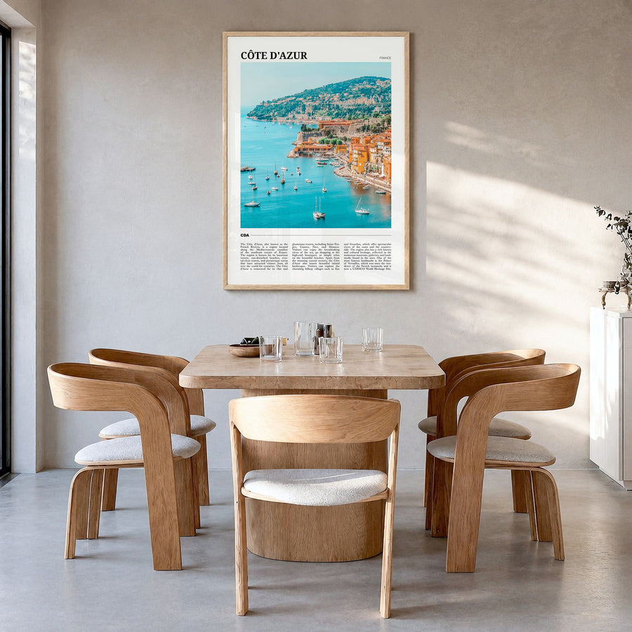 Côte d'Azur Travel No 2 Poster in a natural wood frame, hanging in a dining room