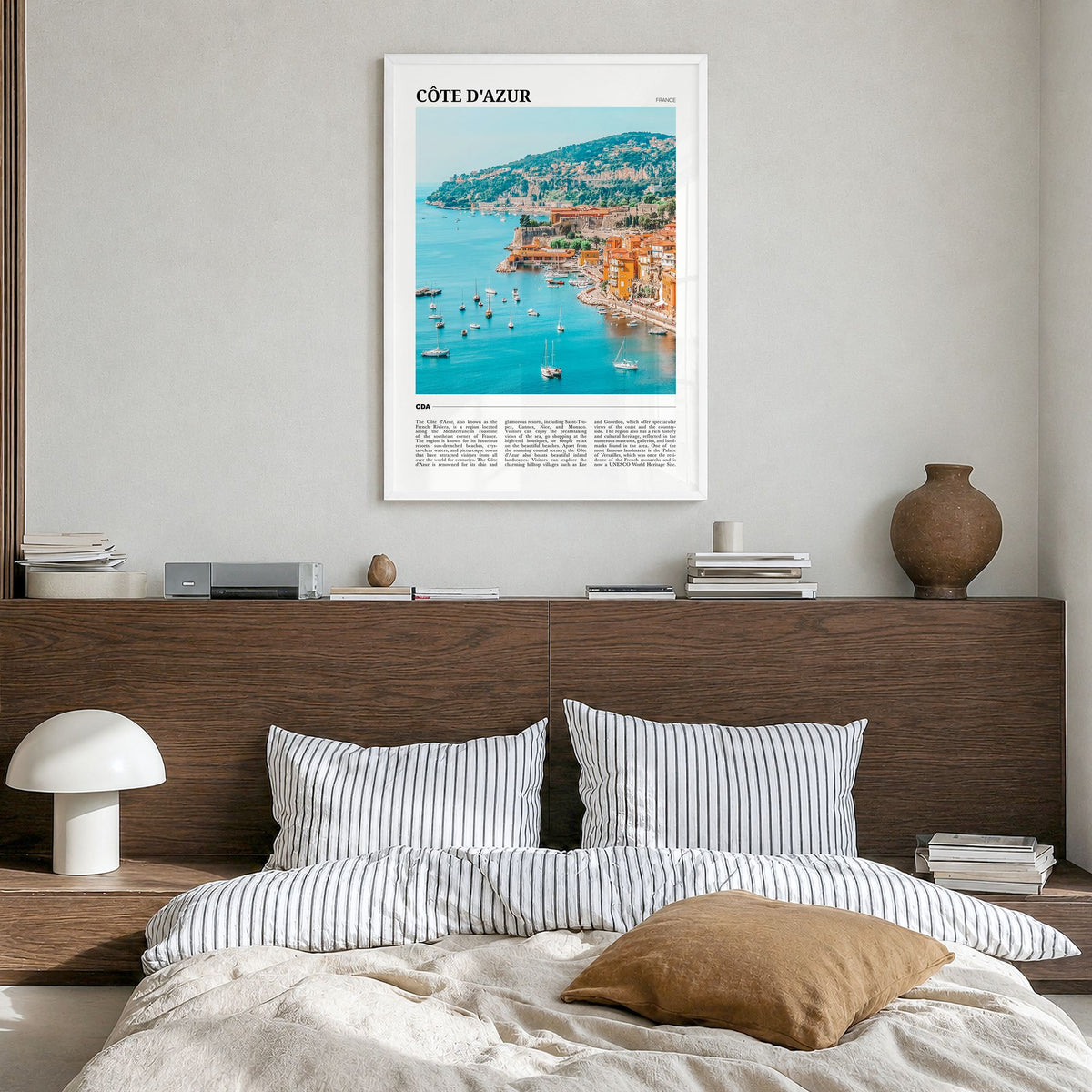 Côte d'Azur Travel No 2 Poster in a white wood frame, hanging in a bedroom