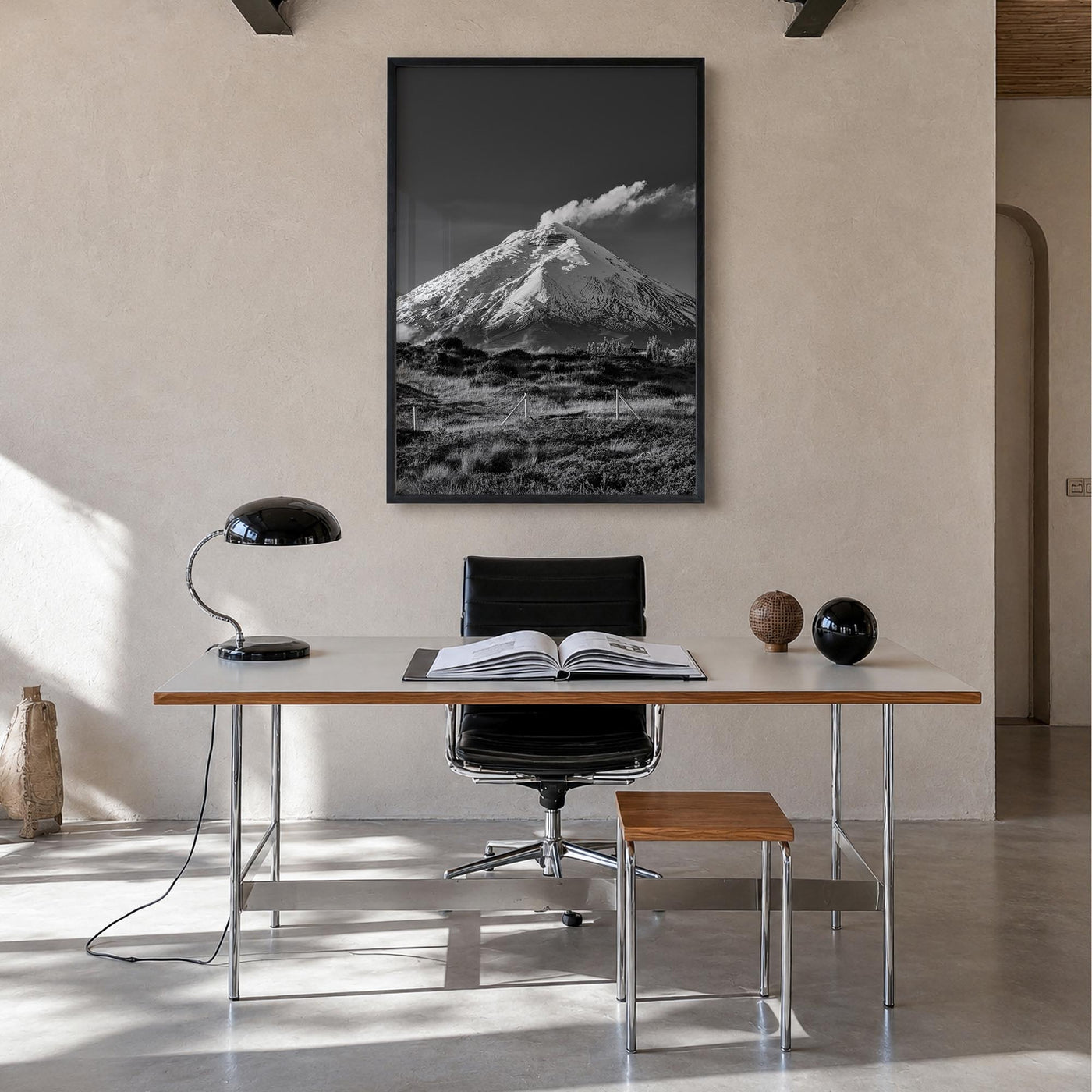 Cotopaxi black & white photo poster of Ecuador – vertical wall art in black wood frame, hanging on wall