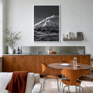 Cotopaxi black & white photo poster of Ecuador – vertical wall art in white wood frame, hanging on wall